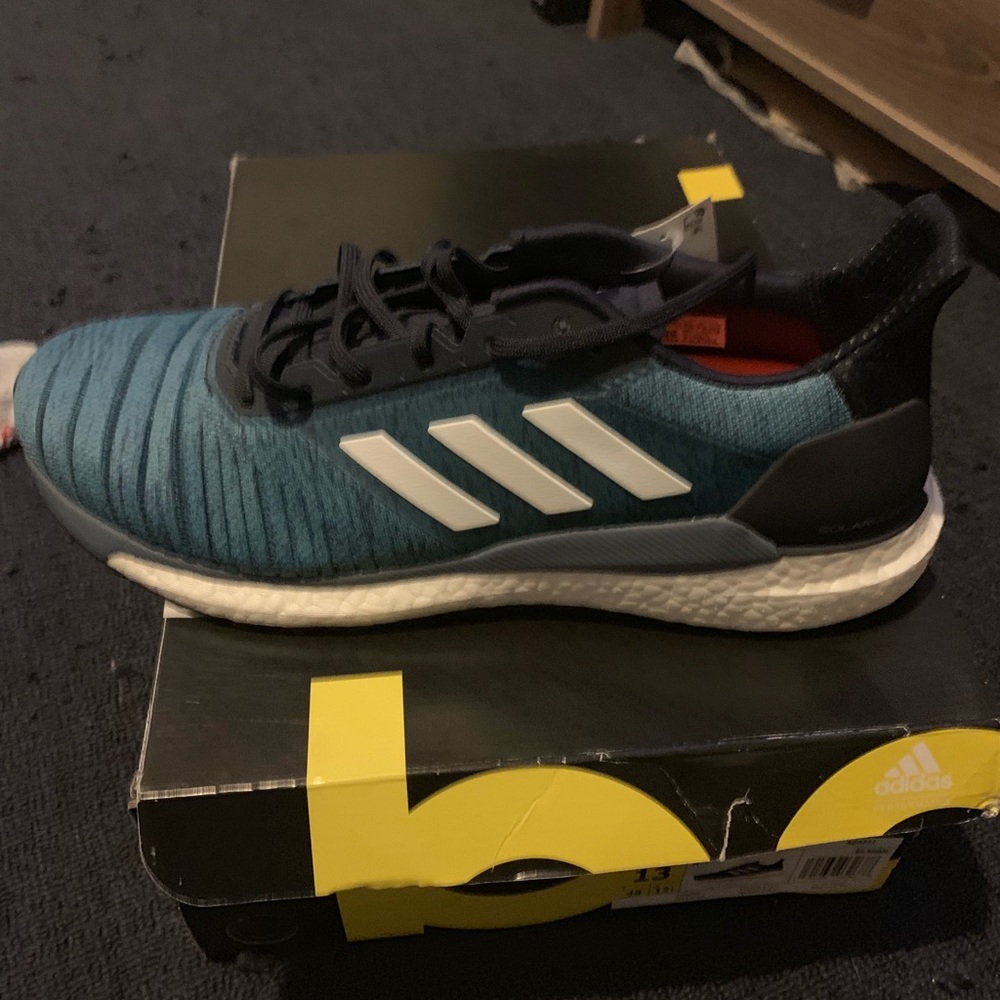 Brand new size 13 solar ultra boost adidas